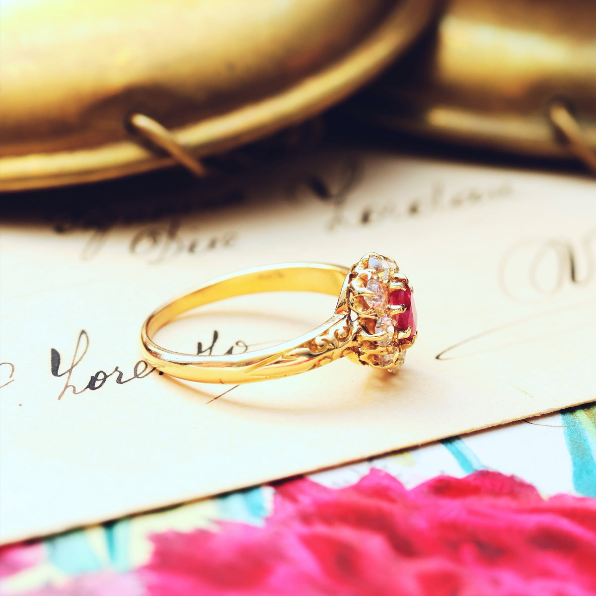 An Antique Ruby & Diamond Blossom Engagement Ring