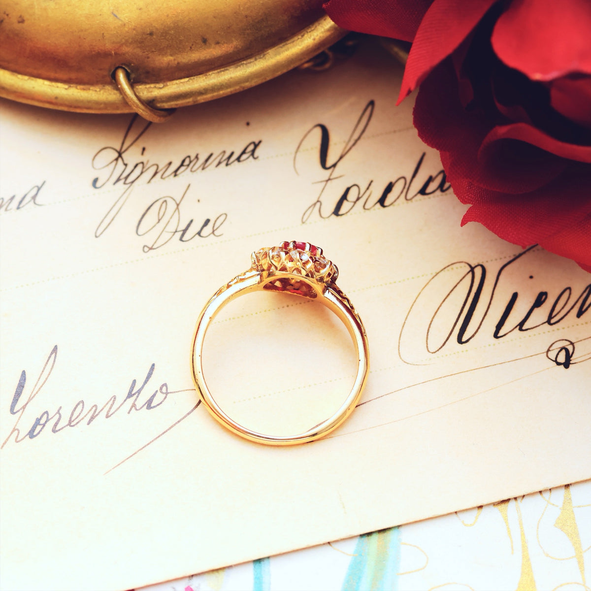 An Antique Ruby & Diamond Blossom Engagement Ring