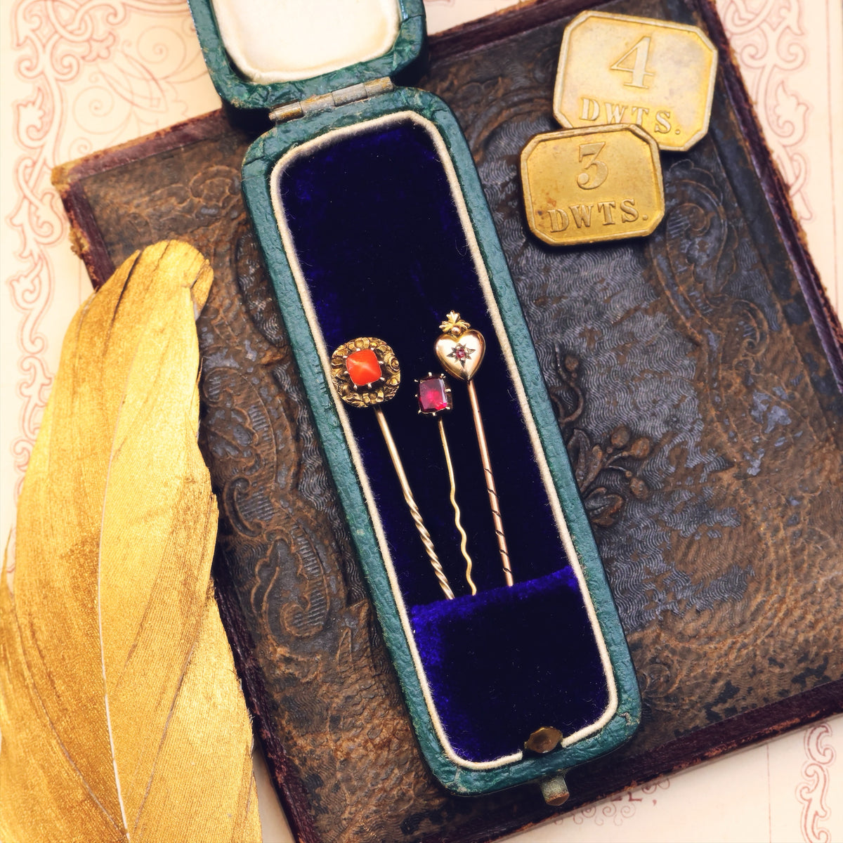 A Trio of Miniature Antique Stick Pins