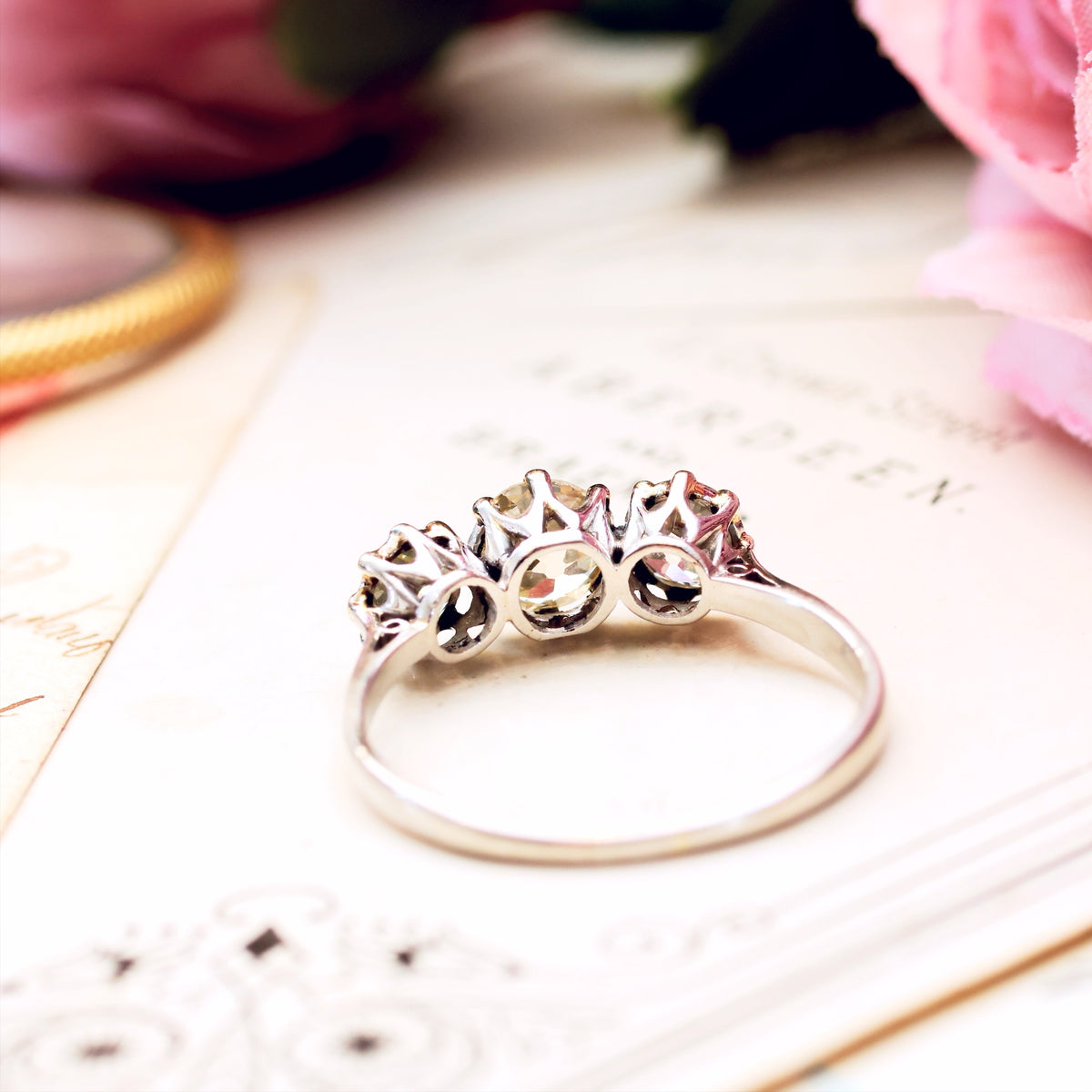 Vintage Platinum Three Stone Diamond Engagement Ring