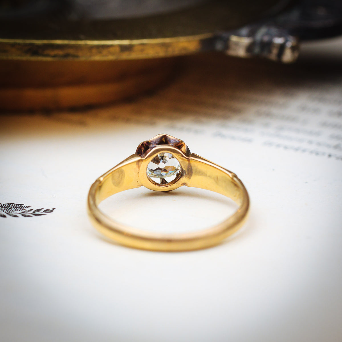 Captivating Antique Cushion-cut Diamond Solitaire Engagement Ring