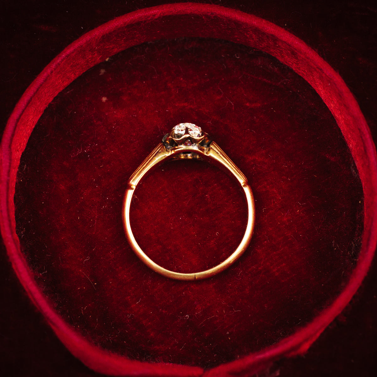 Captivating Antique Cushion-cut Diamond Solitaire Engagement Ring