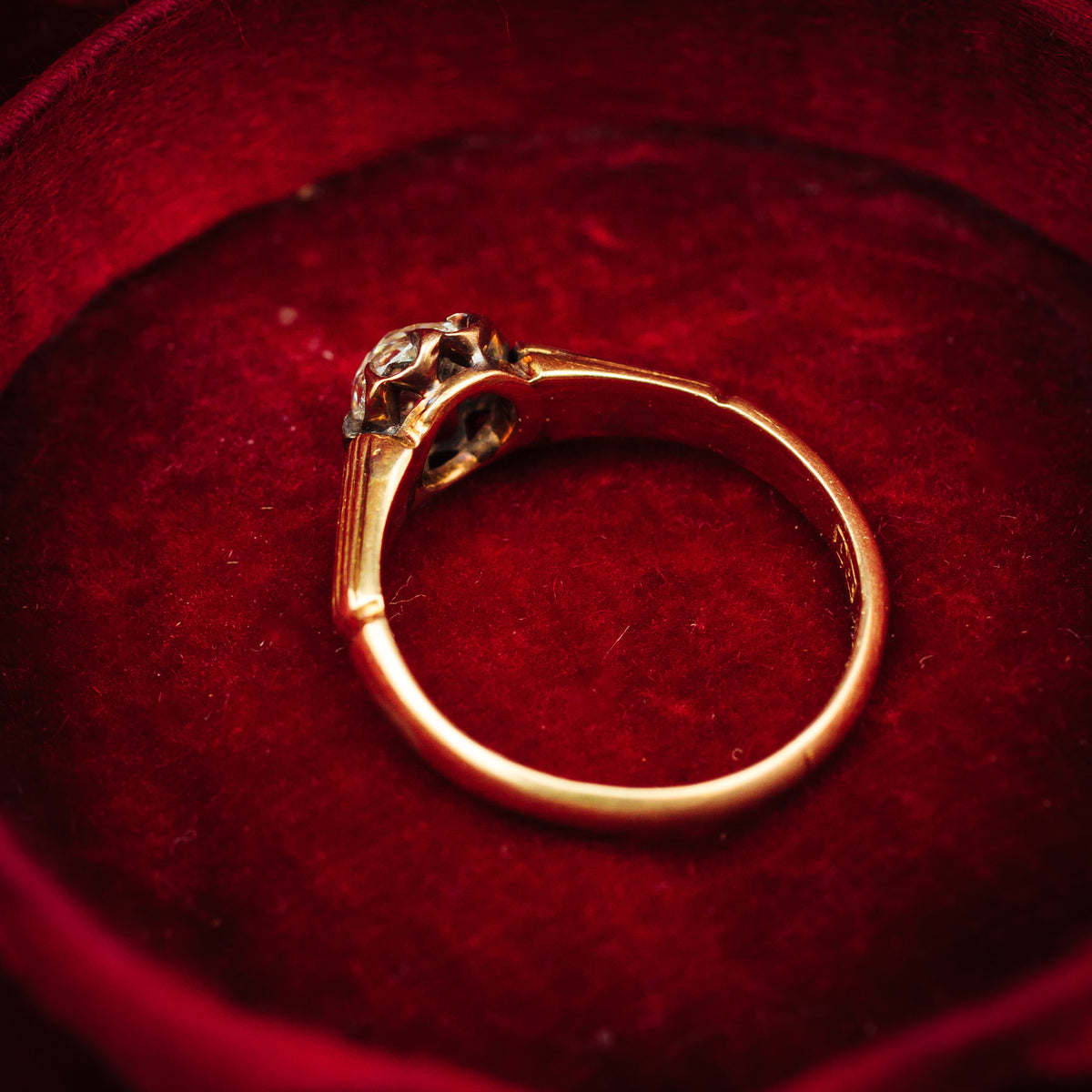 Captivating Antique Cushion-cut Diamond Solitaire Engagement Ring