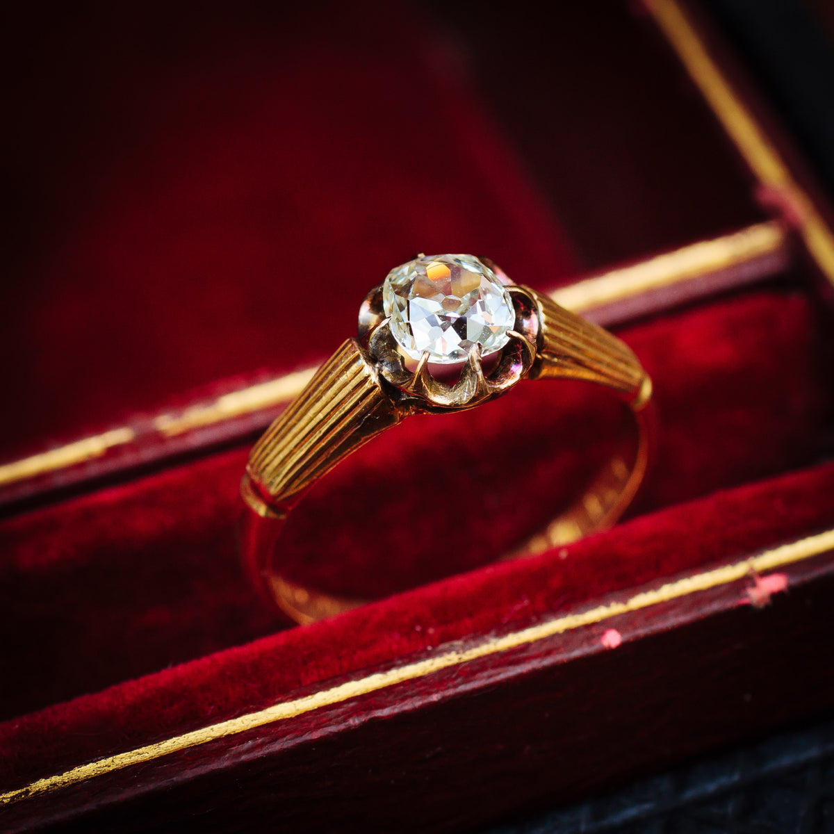 Antique Cushion-cut Diamond Solitaire Engagement Ring