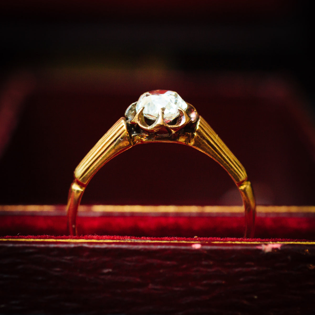 Captivating Antique Cushion-cut Diamond Solitaire Engagement Ring