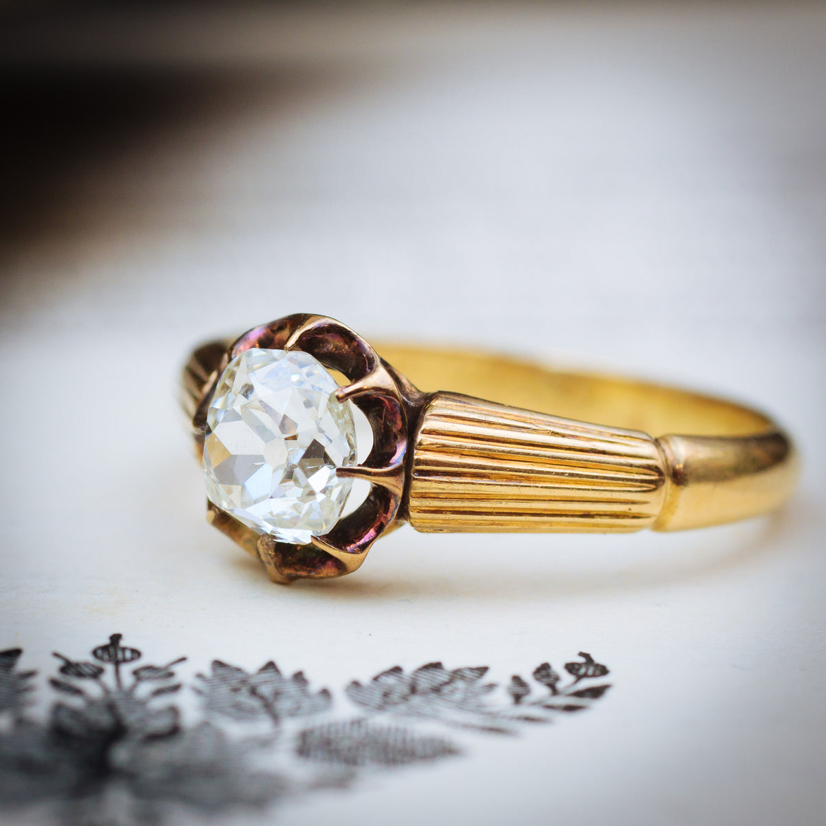 Antique Cushion-cut Diamond Solitaire Engagement Ring