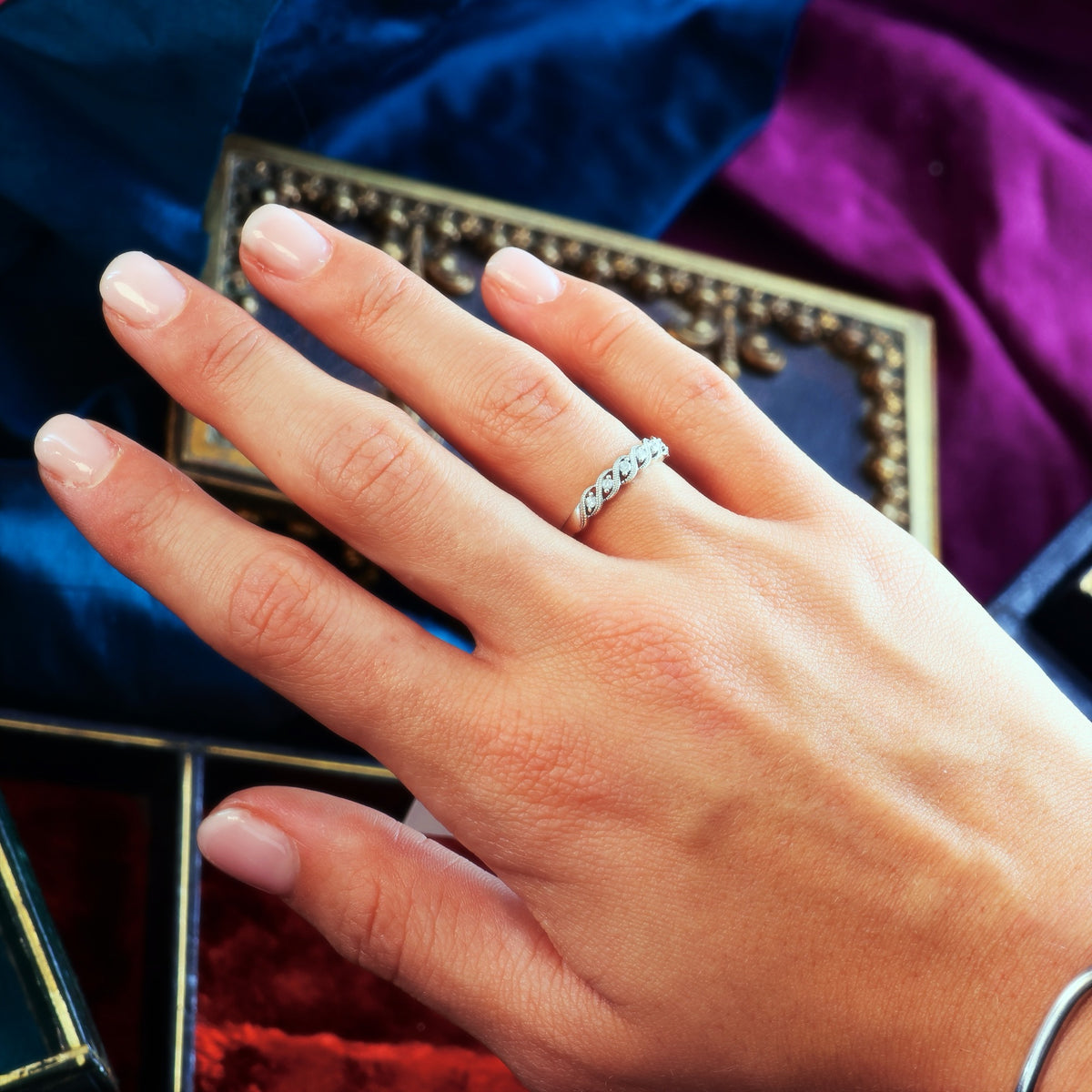 A Petite 9ct White Gold Diamond Half Eternity Band
