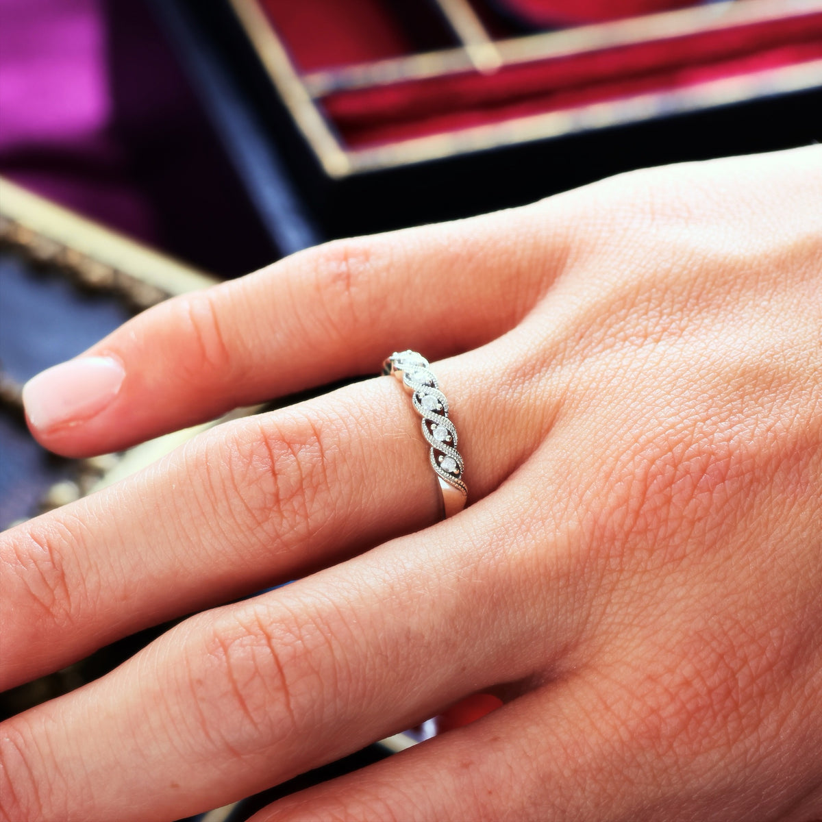 A Petite 9ct White Gold Diamond Half Eternity Band