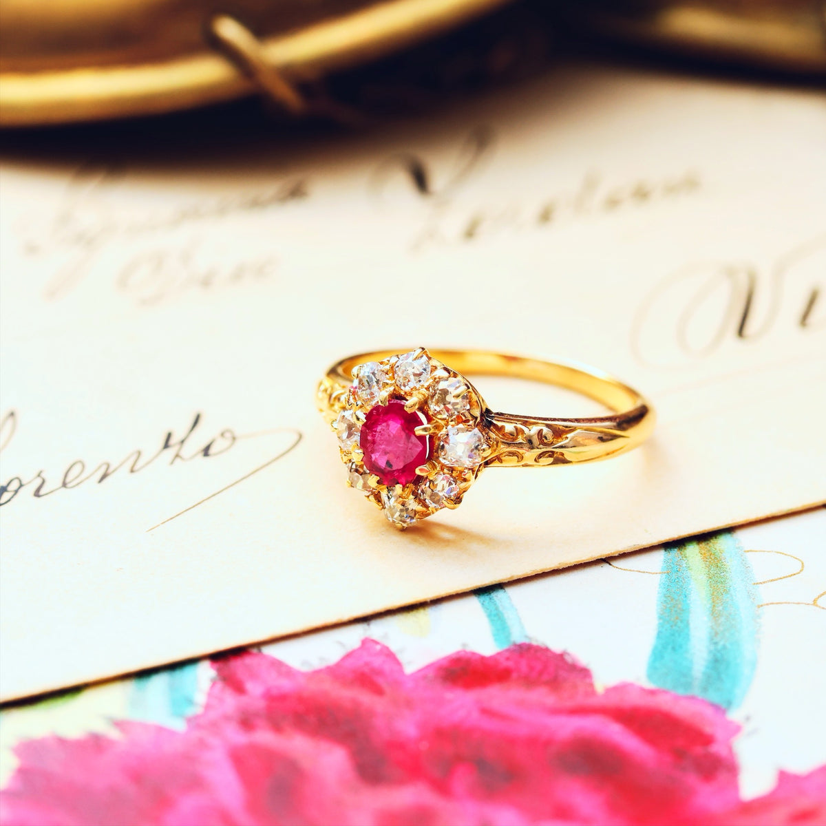 An Antique Ruby & Diamond Blossom Engagement Ring
