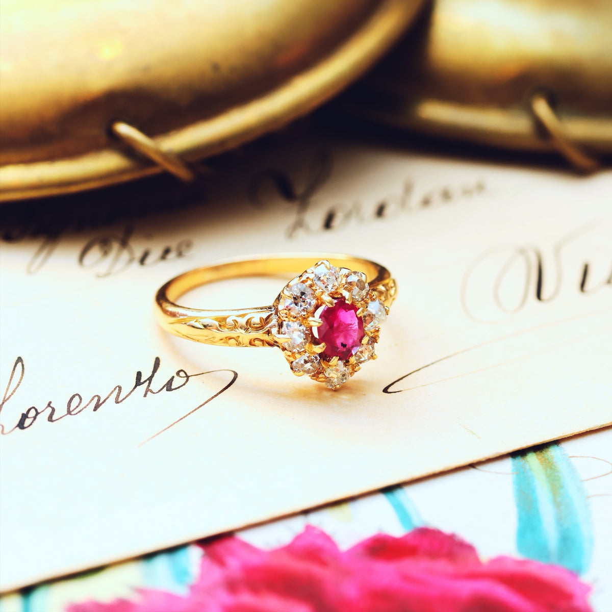 An Antique Ruby & Diamond Blossom Engagement Ring