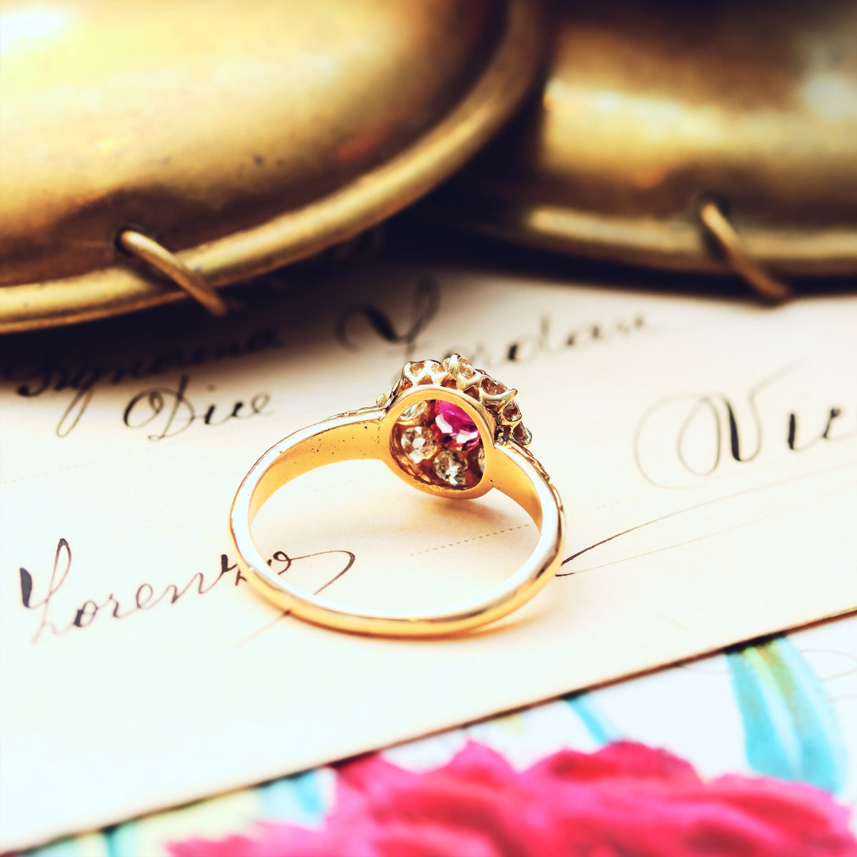 An Antique Ruby & Diamond Blossom Engagement Ring