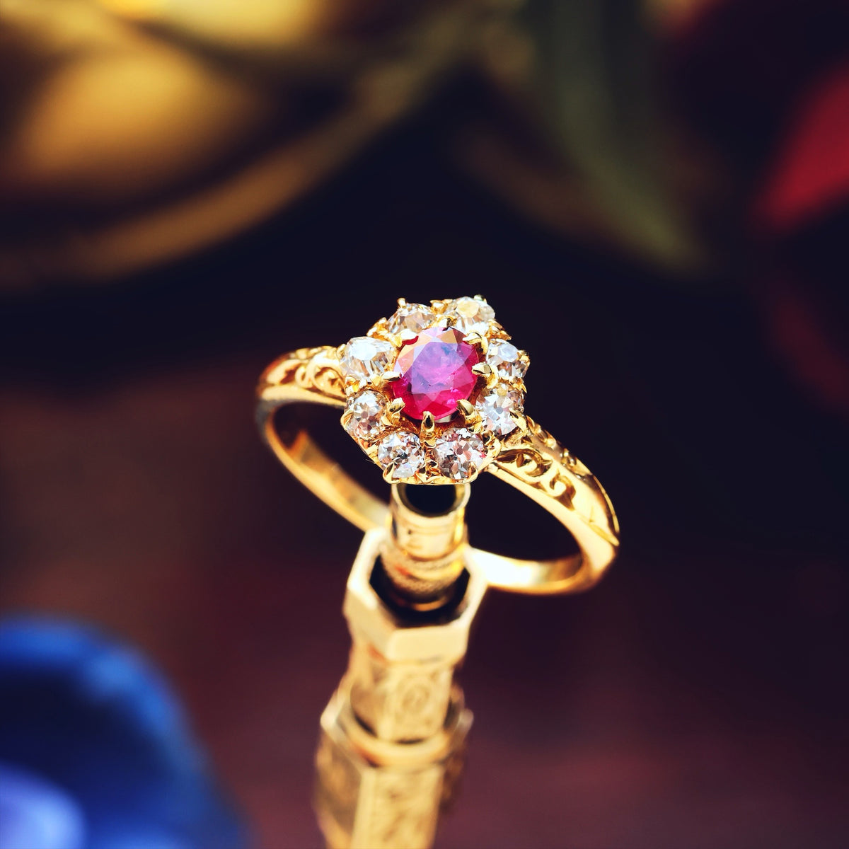 An Antique Ruby & Diamond Blossom Engagement Ring