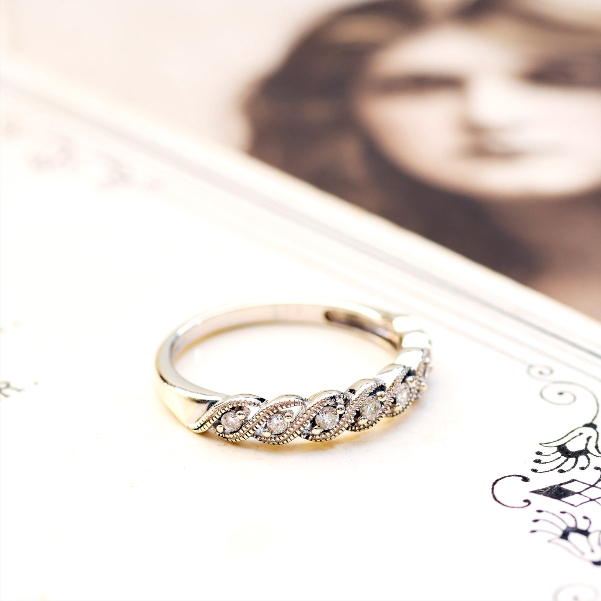 A Petite 9ct White Gold Diamond Half Eternity Band