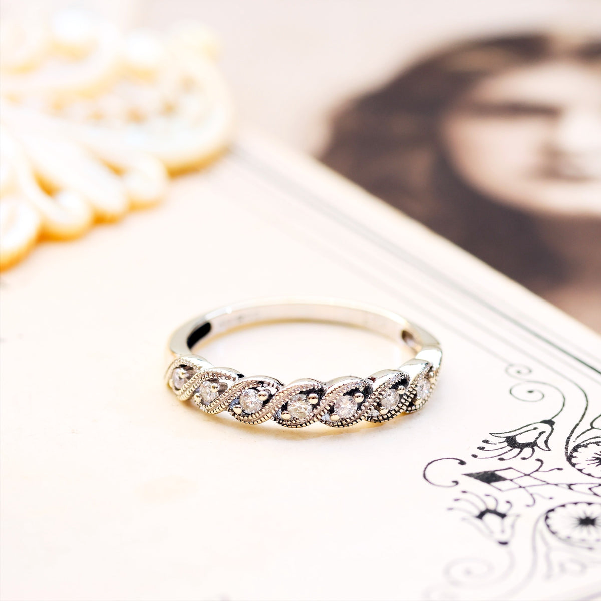 A Petite 9ct White Gold Diamond Half Eternity Band