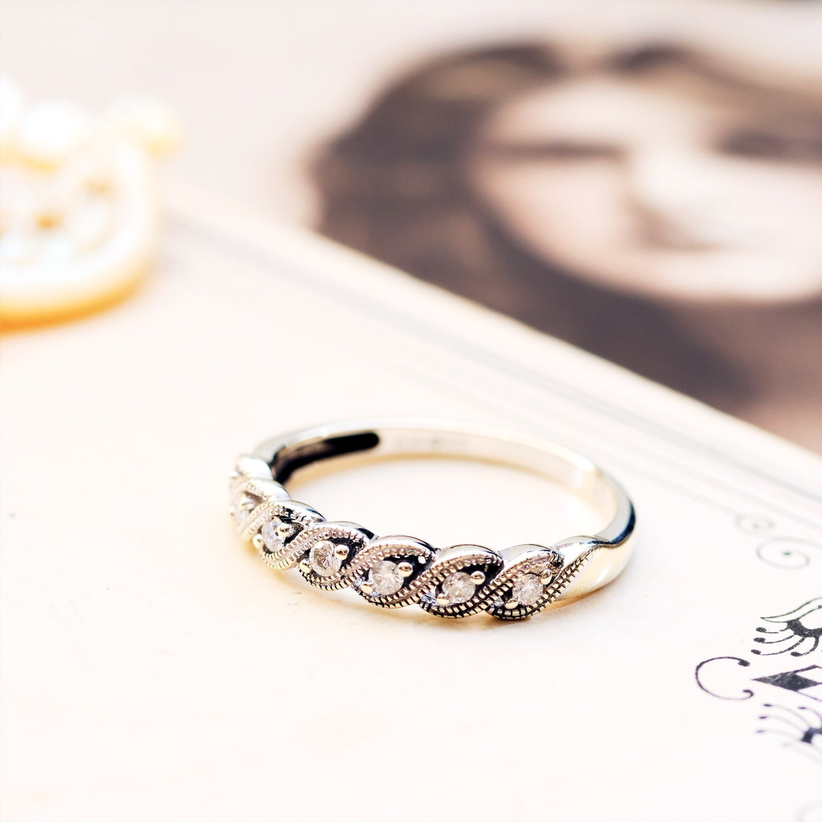 A Petite 9ct White Gold Diamond Half Eternity Band