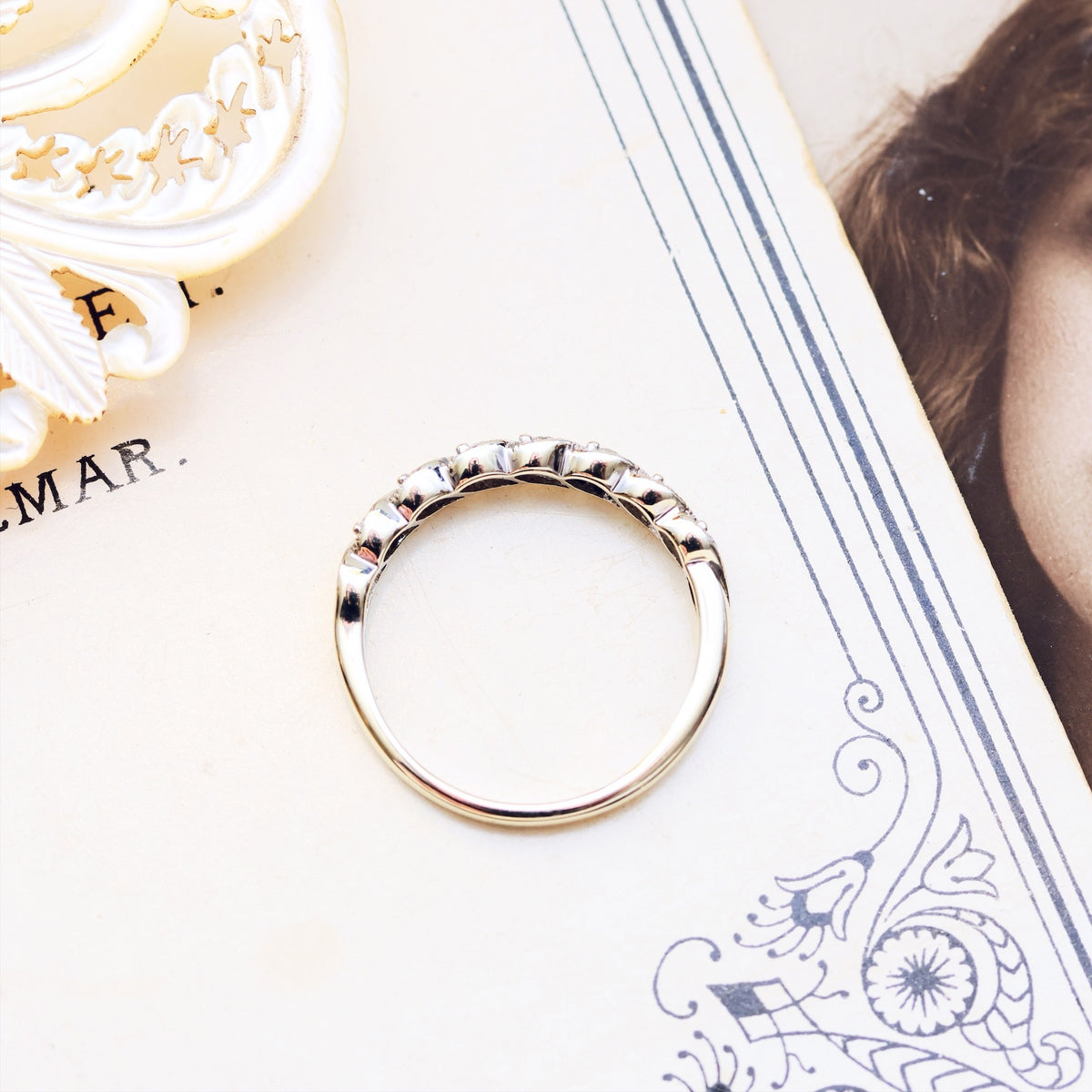 A Petite 9ct White Gold Diamond Half Eternity Band