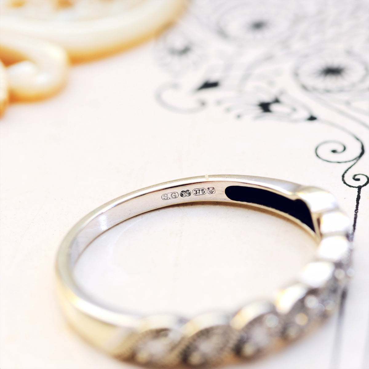 A Petite 9ct White Gold Diamond Half Eternity Band