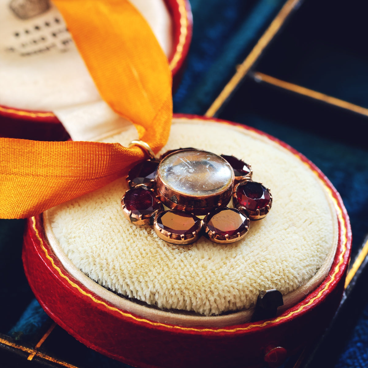 Circa 1820 Georgian Flat Top Garnet Lace Locket