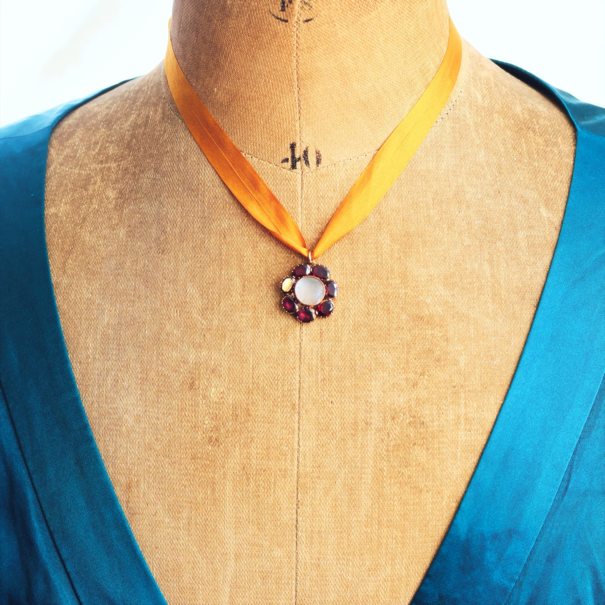 Circa 1820 Georgian Flat Top Garnet Lace Locket