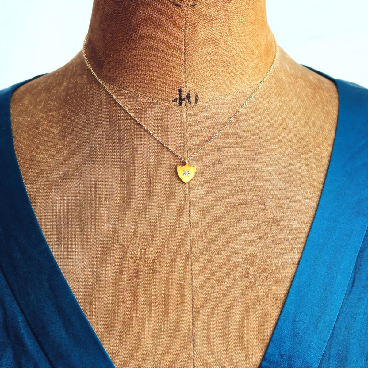 Darling Lil' Antique Diamond Shield Pendant