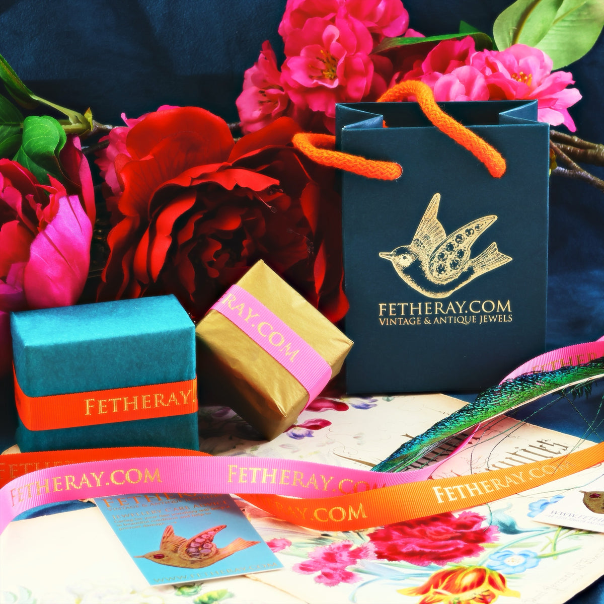 Fetheray jewellery packaging with flowers and ribbons on a floral background
