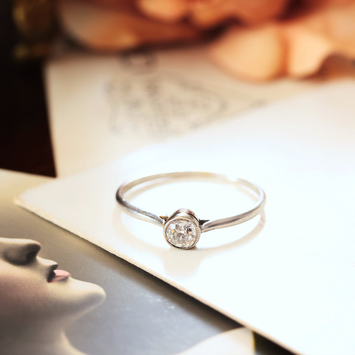 Rubover Setting Diamond Solitaire Engagement Ring