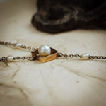 An Antique Platinum and Natural Pearl Lavaliere Pendant