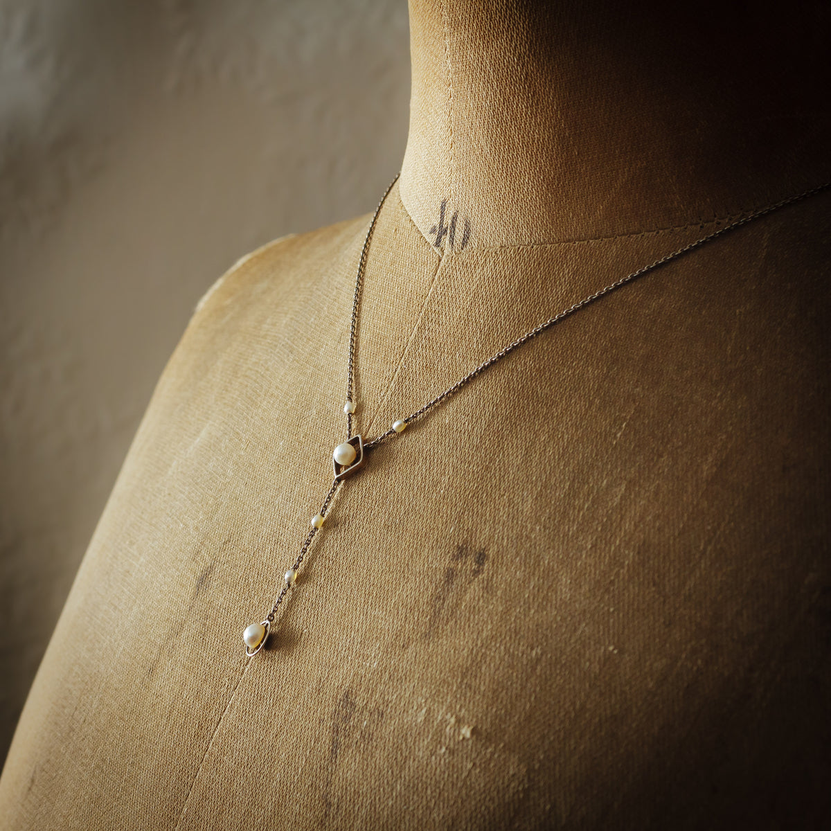 An Antique Platinum and Natural Pearl Lavaliere Pendant