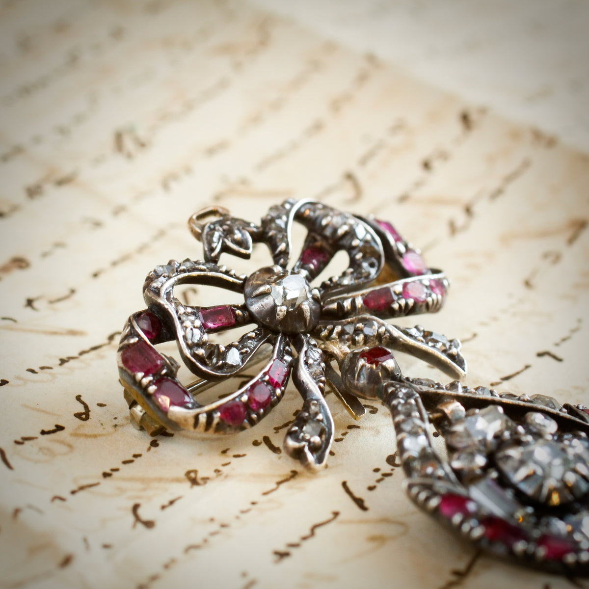 A Rare Antique Pendeloque Bodice Jewel set with Table Cut Diamonds and Rubies