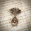A Rare Antique Pendeloque Bodice Jewel set with Table Cut Diamonds and Rubies