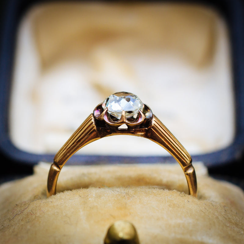 Captivating Antique Cushion-cut Diamond Solitaire Engagement Ring