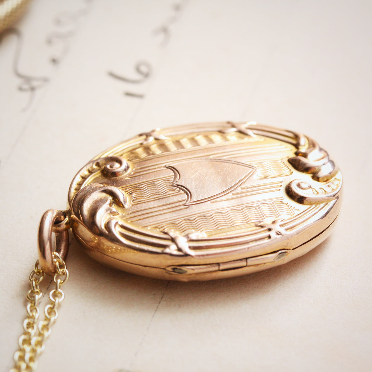 An Antique Edwardian Era Gold Locket