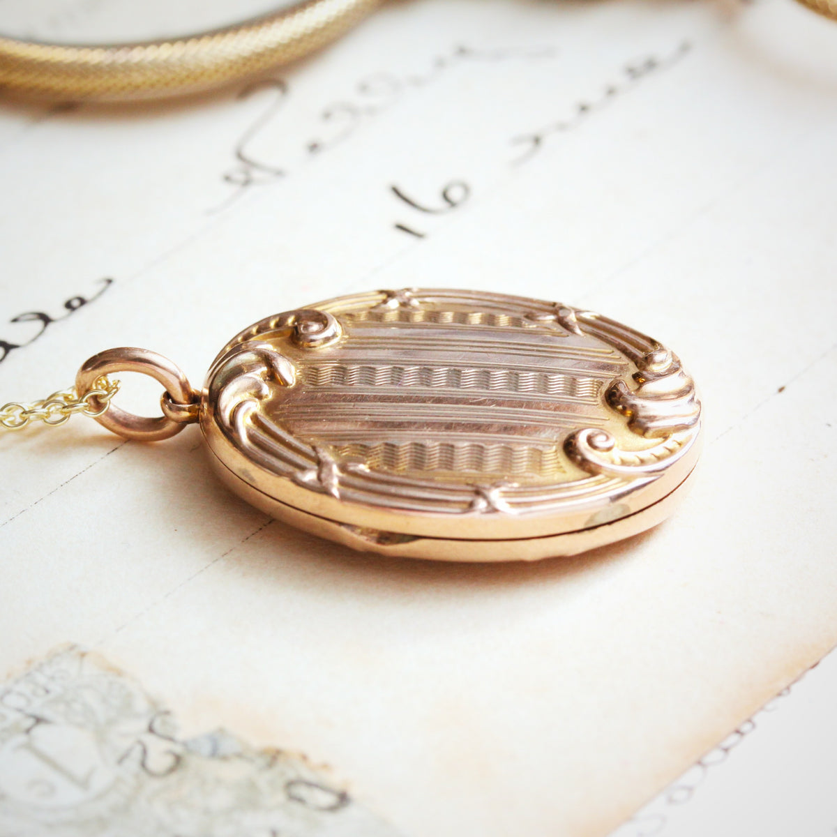An Antique Edwardian Era Gold Locket