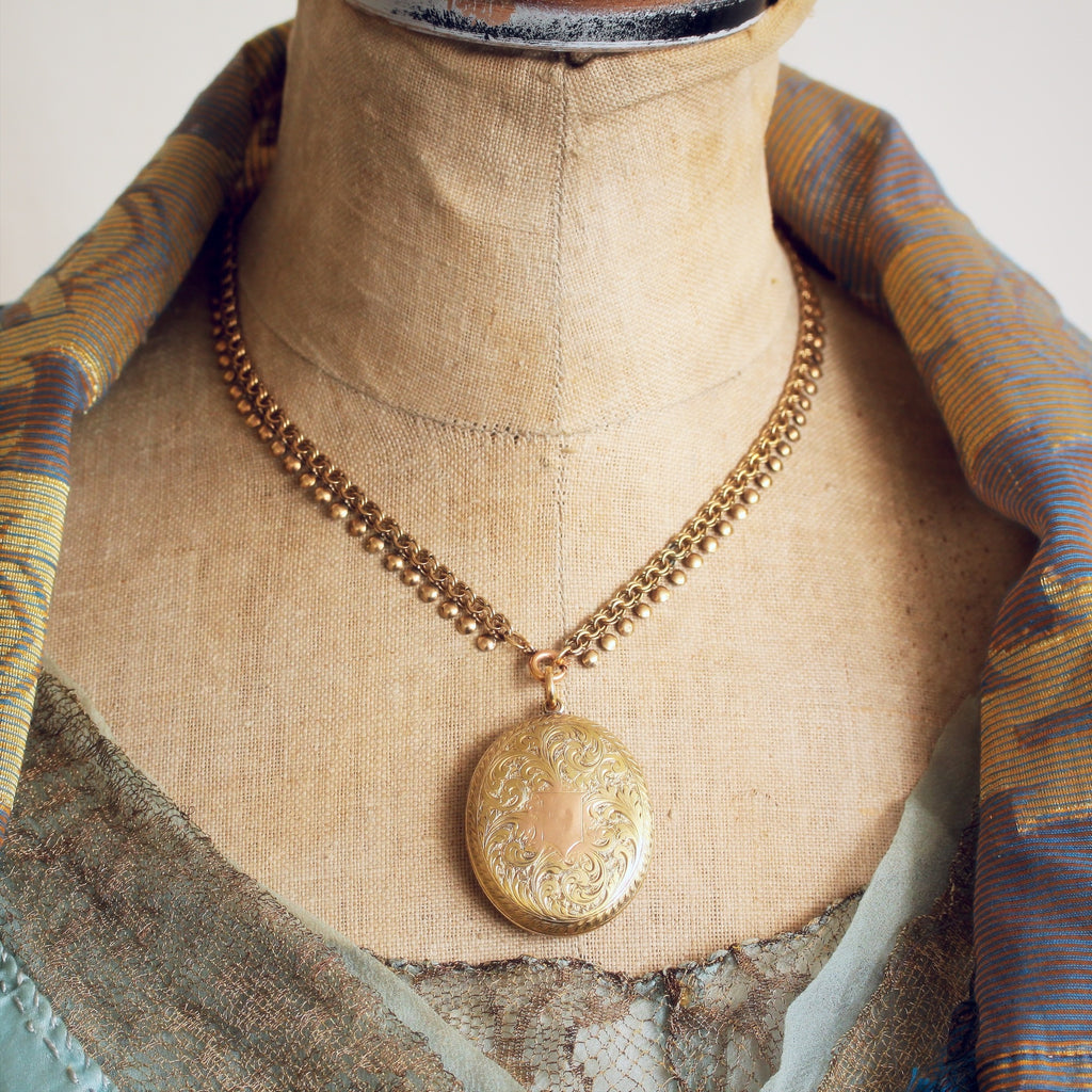 Pinchbeck locket best sale