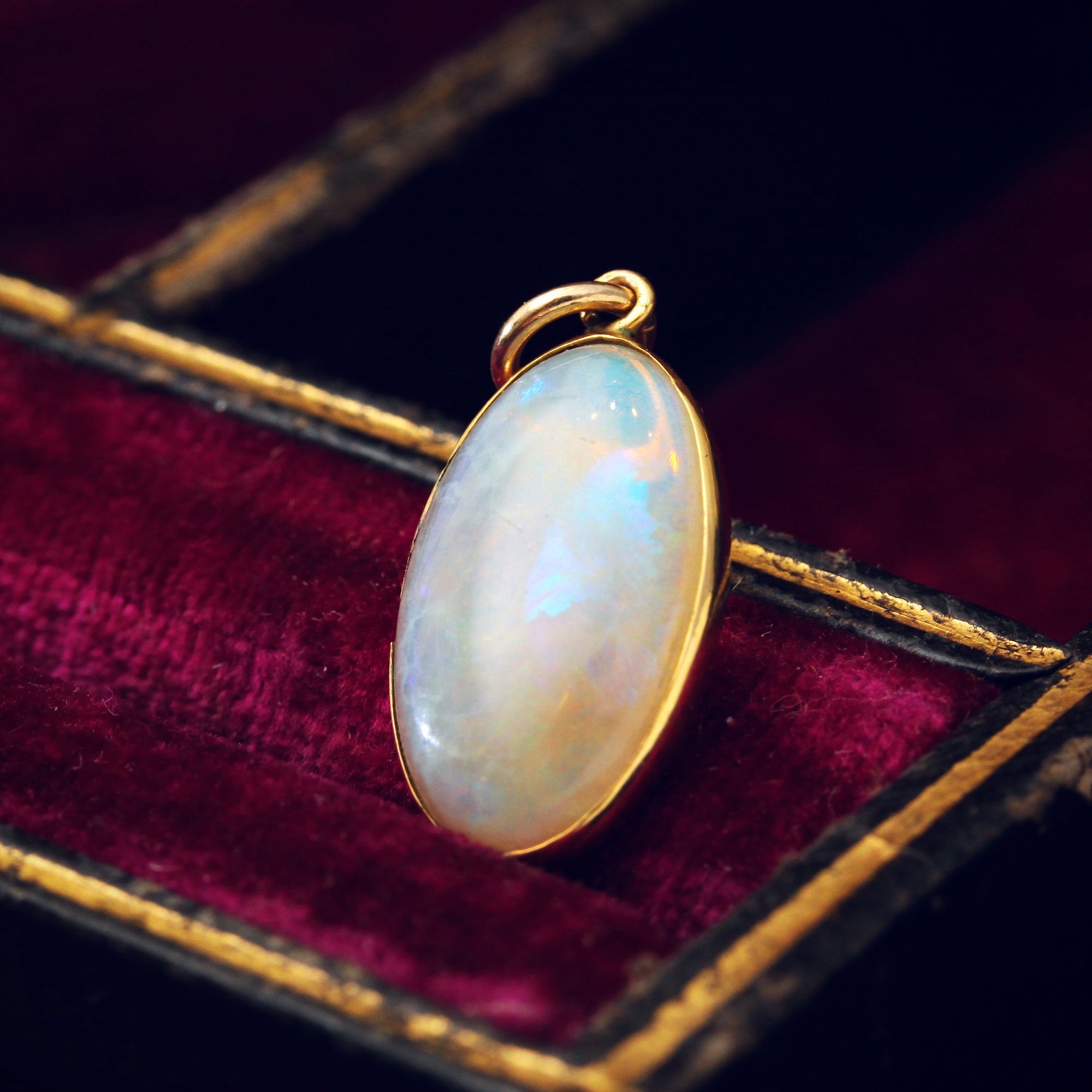 Opal gemstone pendant top