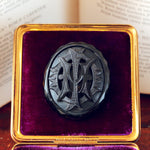 Victorian Whitby Jet 'IMO' Brooch