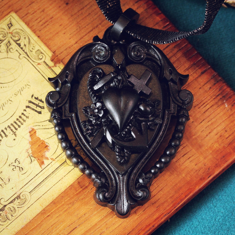 Victorian Gothic Vulcanite Faith, Hope & Charity Locket