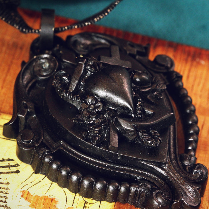 Victorian Gothic Vulcanite Faith, Hope & Charity Locket