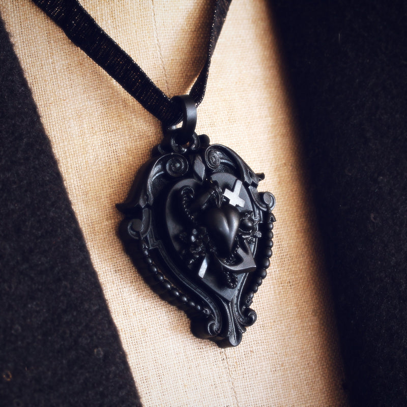 Victorian Gothic Vulcanite Faith, Hope & Charity Locket