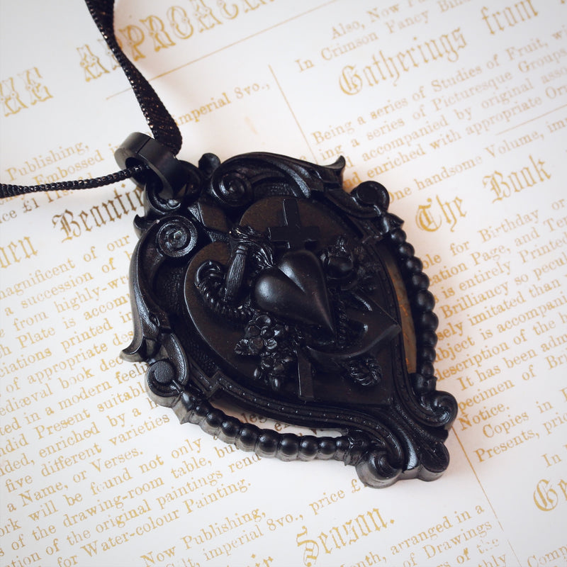 Victorian Gothic Vulcanite Faith, Hope & Charity Locket