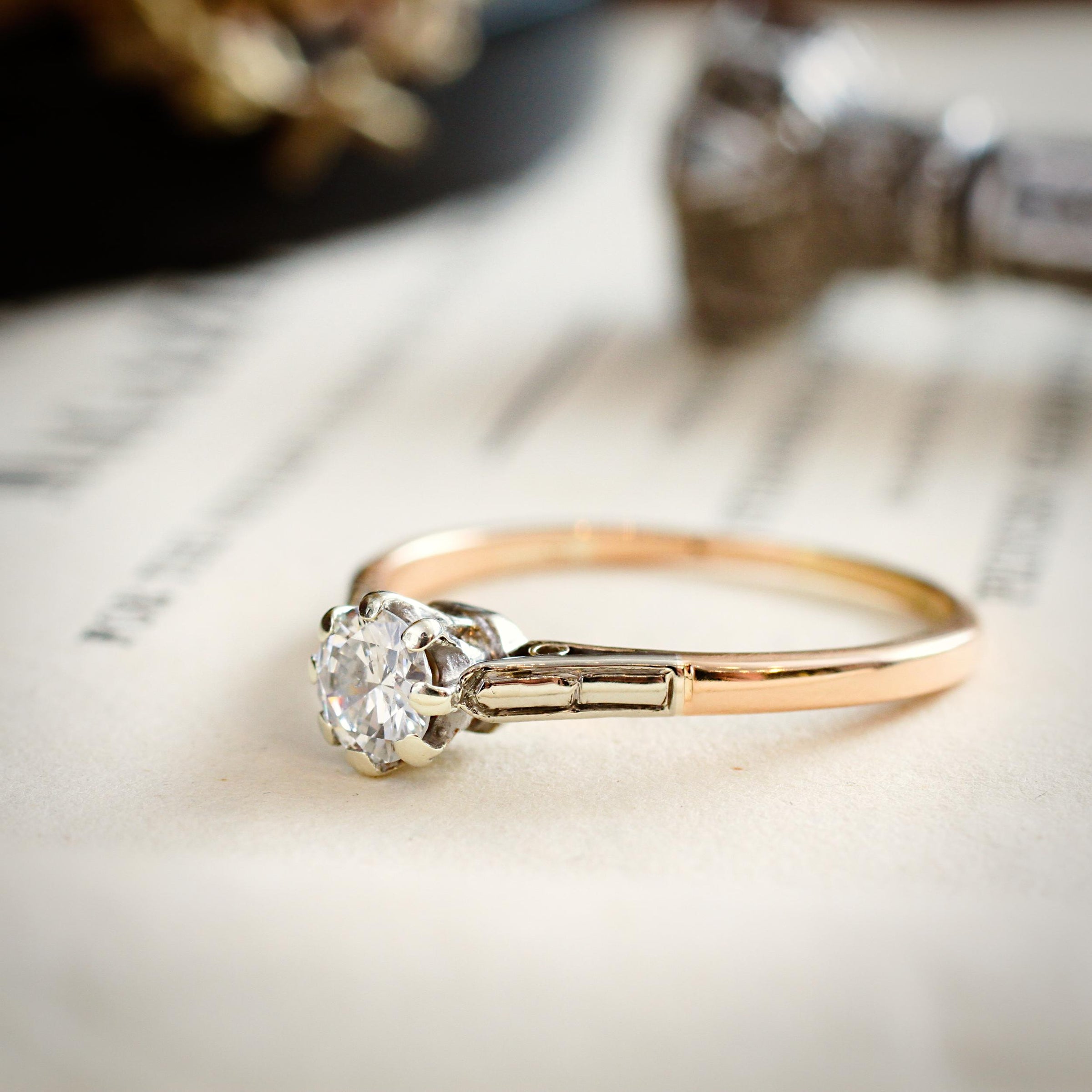 Solitaire diamond ring with baguettes discount