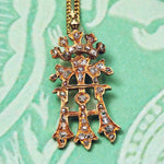 An Antique Diamond Initial 'A' Pendant with Cross & Coronet