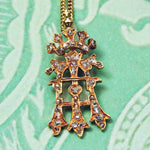 An Antique Diamond Initial 'A' Pendant with Cross & Coronet